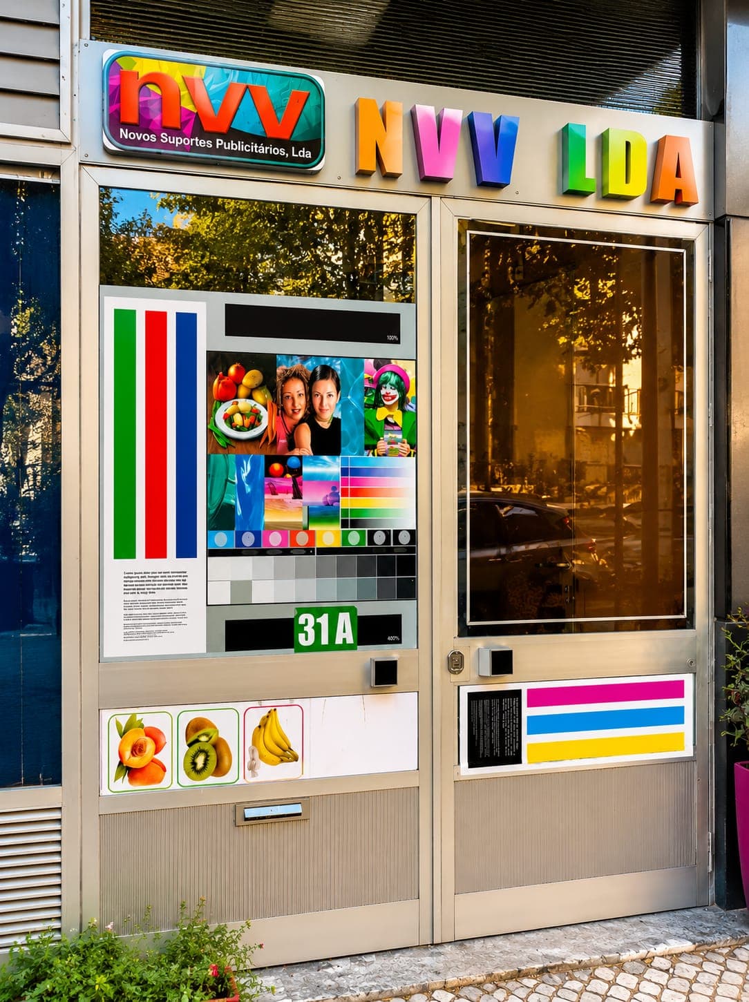 NVV Lda shopfront with printed colour proof in the window